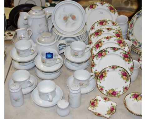 A Royal Albert Old Country Roses dinner plate; four side plates; trinket dishes; a Denby tea service