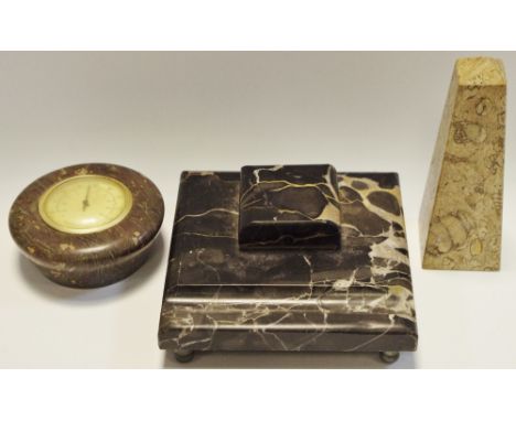 An Art Deco marble inkwell; a desk thermometer; a fossil stone obelisk (3)