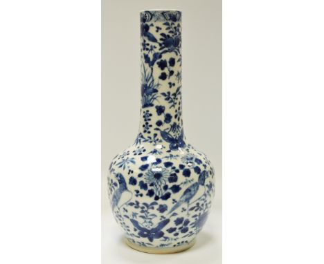 A blue and white bottle neck vase with Kangxi marks