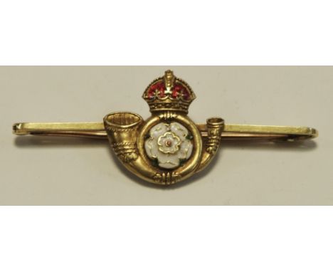 A 10ct gold Yorkshire Light Infantry lapel badge 4.9g gross 