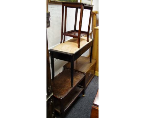 An ebonised duet stool; a mahogany nest of two tables; a 1940's oak log bin; a 1940's oak tea trolley. (4)