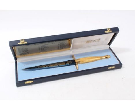 Fine Wilkinson Sword commemorative Commando dagger with gilded hilt, blue and gilt blade 'The Special Air Service Regiment Go