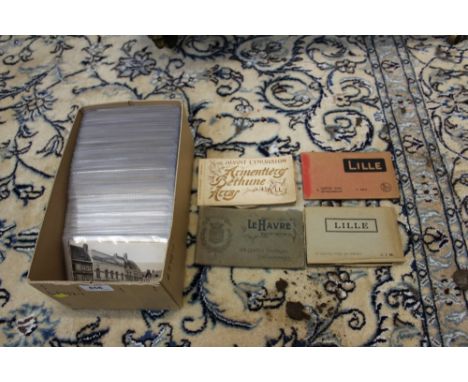 Large collection of First World War photographic postcards - mainly town scenes