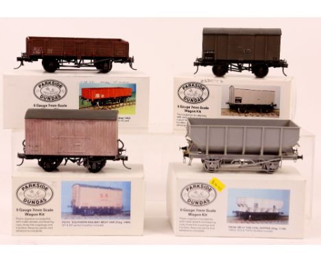 Four Parkside Dundas O gauge assembled wagons, comprising PS101 Southern Railway meat van, PS104 BE 21-ton coal hopper, PS112