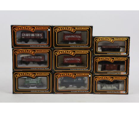 Collection of thirty-eight Mainline 00 gauge wagons, comprising 2x 37428 7 plank 'Emlyn', 2x  937353 Bogie Bolster A, 37171 B