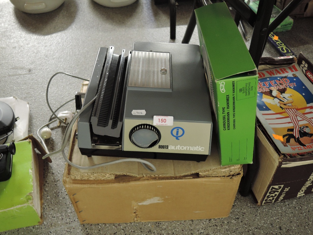 A Boots automatic slide projector with box and slide trays