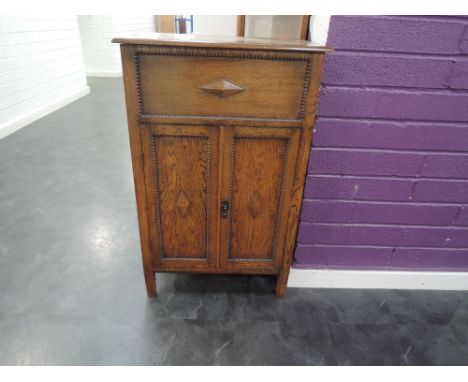 An early 20th Century oak gramophone cabinet (empty)