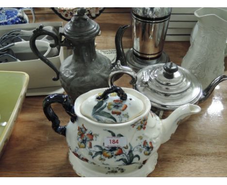 A selection of teapots including ceramic plated and pewter