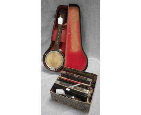 A BANJOLELE in fitted case and a small early 20th century accordion 'The Victor' (2)