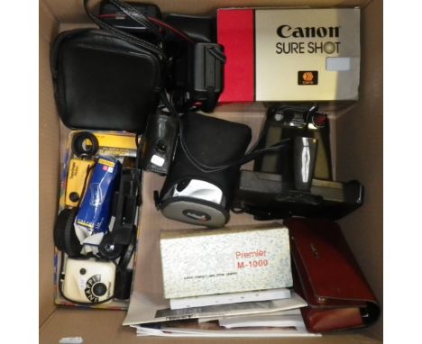 A POLAROID SUPER SWINGER CAMERA,  a Cannon camera and a collection of accessories