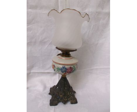 Metal based table lamp, the white shade hand painted coloured floral sprays, ornately shaped clouded glass shade and chimney