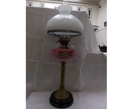 Fine circular pot based lamp with brass corinthian column the mottled shades of pink decorated coloured floral sprays mushroo