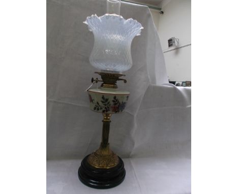 Ornate circular pot based table lamp with brass corinthian column the white bowl decorated multi-coloured sprays, vaseline gl