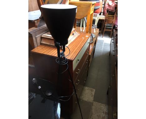 A METAL TRIPOD LAMP