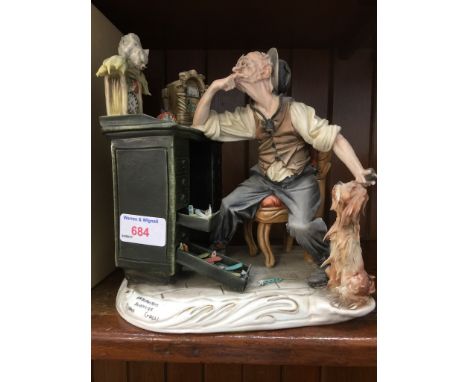 CAPO DI MONTE FIGURE OF A MAN AT HIS DESK. H23CMCONDITION:  FINGER MISSING ON LEFT HAND, FINIAL MISSING ON THE CLOCK.