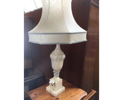 A MARBLE EFFECT TABLE LAMP