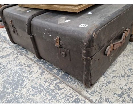An antique travel cabin trunk.