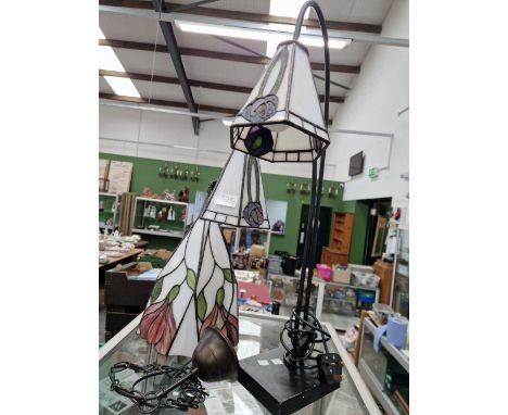 A table lamp with two leaded glass shades together with a similar ceiling light