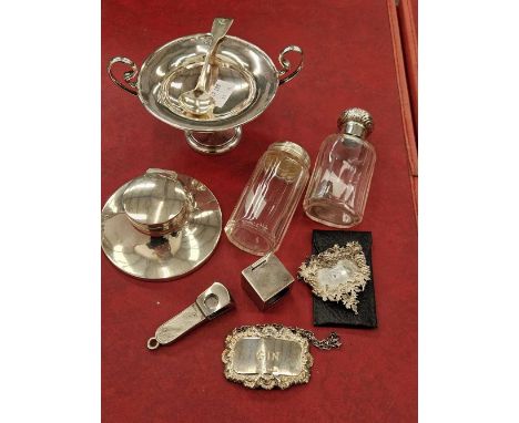 Two hallmarked silver decanter labels, a small tazza, a capston inkwell, cigar cutter, mustard spoon, collar stiffners, two s