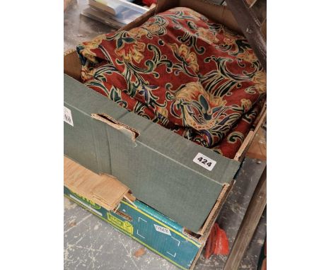 A collection of wood veneers together with a pair of curtains
