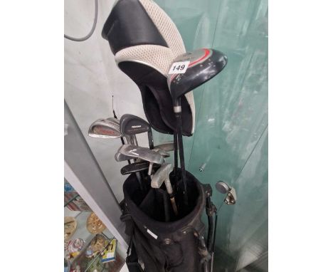 A bag of Howson, Trident, Sootia and other golf clubs