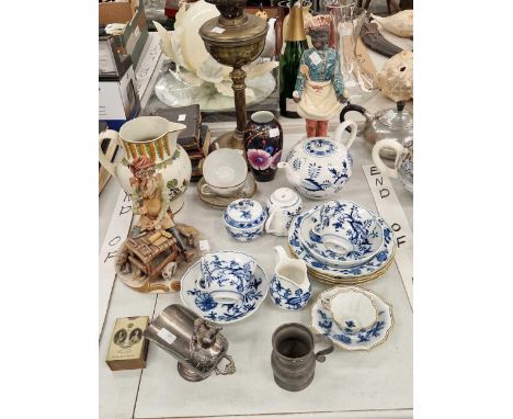 Meissen onion pattern tea wares, an oil lamp, a Prattware jug, as Capodimontye cobbler, etc