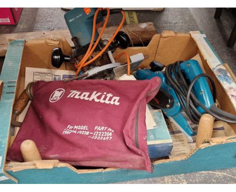 A Makita sanding tool, a Black &amp; Decker micro adjustment saw, a two handled pit saw,