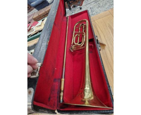 A vintage silver plated trombone