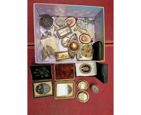 An antique mourning brooch, two portrait brooches, a silver inlaid brooch, silver pill box, ecclesiastical tokens, brooches, 