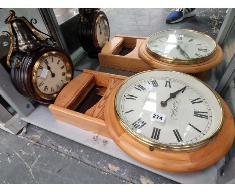 An alarm clock surmounted by its bell together with a pine drop case wall clock