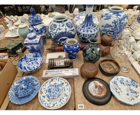 Three large oriental blue and white vases, a lidded jar, other various ceramics including a prattware pot lid.