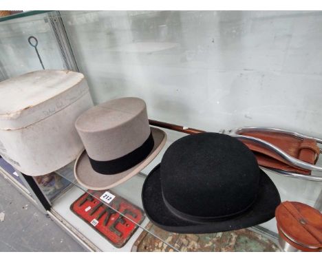 A Townend grey top hat sized 6 3/4, a bowler hat a shooting stick and a nest of beakers