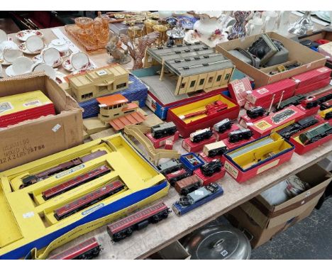 A collection of Hornby Dublo 00 guage locomotives, rolling stock, track and trackside buildingsEngine Shed 5005, Caledonian P