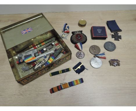 A tin of Medallions, Ribbons and Patches etc including two Baden Powell Medallions, 1919 Great War Medallion, 1831 Coronation
