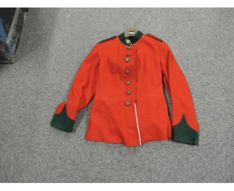A pre WWI British Army Tunic and Trousers with 7 buttons to front, 2 buttons to shoulders and 6 buttons to back, with origina
