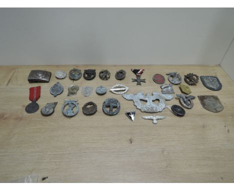 A collection of 28 German Badges and Medals, WWII period and some slightly earlier but post WWI, including Luftwaffe Anti Air