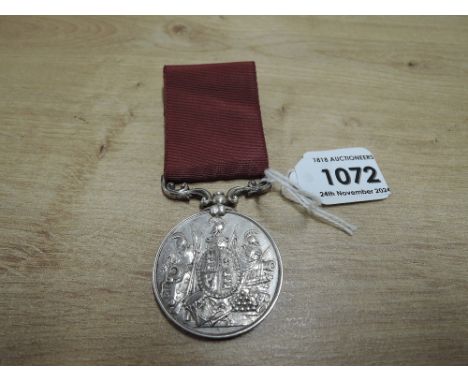 A Queen Victoria Army Long Service And Good Conduct Medal with swivel suspender and ribbon named to 1008 PTE.G.HAZELL.7TH.HUS