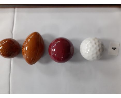 Four W L S ltd Torquay pottery sport balls for Scotch Whiskey three with contents.