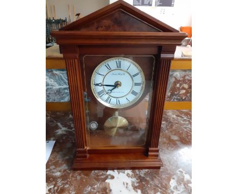 A Victorian style mantle clock