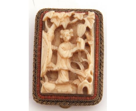 Vintage Chinese carved ivory clip of rectangular form, the carved panel depicting a Chinese figure in a garden, framed with a