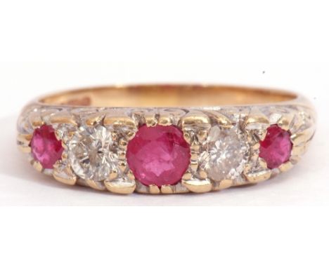 9ct gold ruby and diamond ring, having three round cut graduated rubies and two brilliant cut diamonds, diamond ct wt 0.50 ap