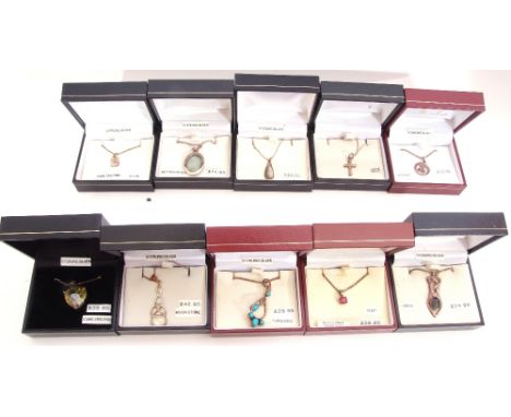 Mixed Lot: ten white metal pendants/necklaces to include turquoise, ruby, and cubic zirconia examples