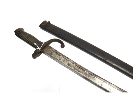 A FRENCH M1866 'CHASSEPOT' YATAGHAN SWORD BAYONET  the back-edge of the blade inscribed 'Mre d'Armes de St. Etienne Mars 1874