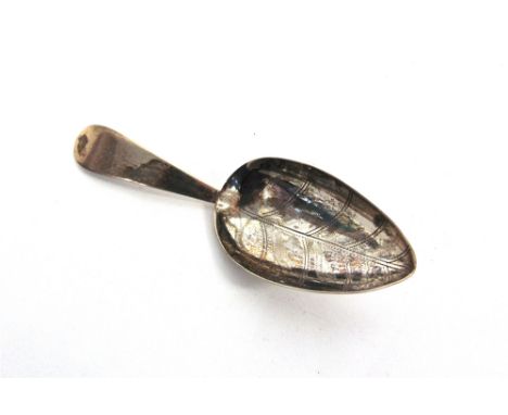 A GEORGE III SILVER CADDY SPOON  possibly George Burrows I, London 1798, the oval bowl engraved as a leaf to a plain handle, 