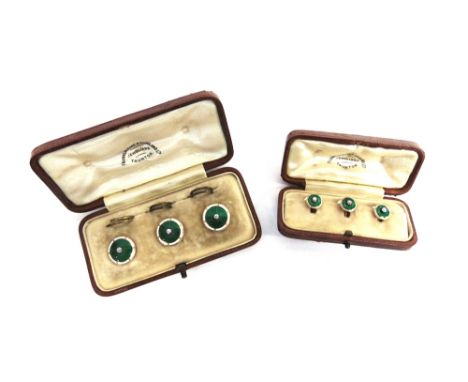 A SET OF THREE DIAMOND AND ENAMEL DRESS BUTTONS the small silver collet set old brilliant cut against a green guilloche groun