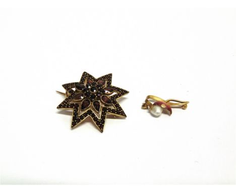 A BOHEMIAN GARNET STARBURST BROOCH 3.7cm across; with a small freshwater pearl and enamel brooch, stamped '14K'; 2.4cm long, 