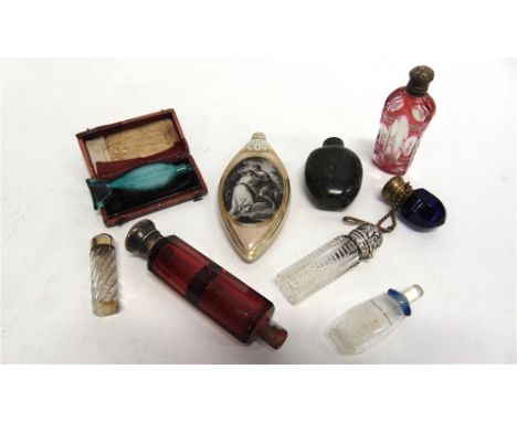 A COLLECTION OF EIGHT SCENT BOTTLES/FLASKS  including a late 18th Century pottery flask with a sepia coloured scene of a coup