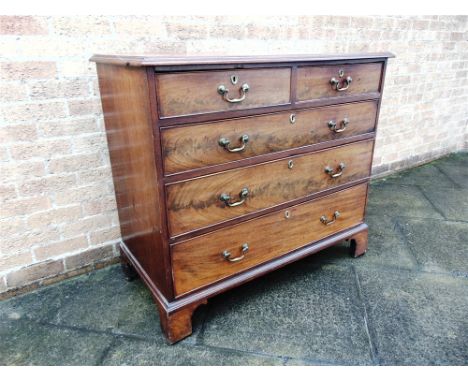 AN EARLY 19TH CENTURY MAHOGANY CHEST OF TWO SHORT AND THREE LONG DRAWERS  on bracket feet, 111cm wide 54cm deep 98cm high