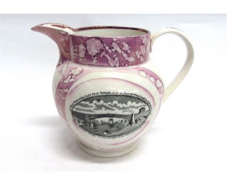 A SUNDERLAND PINK LUSTRE JUG  one side decorated with a West View of the Cast Iron Bridge, the other side with the rhyme 'The