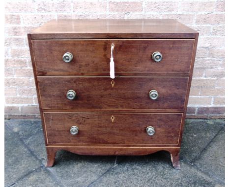 A MAHOGANY CHEST OF THREE LONG GRADUATED DRAWERS  with boxwood edging, on shaped apron and splayed bracket supports, 76cm wid